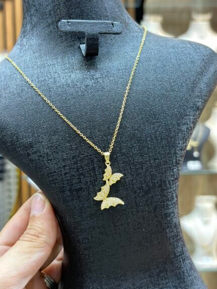 collier 600 papillon