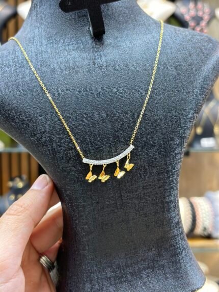 collier papillon strass 600